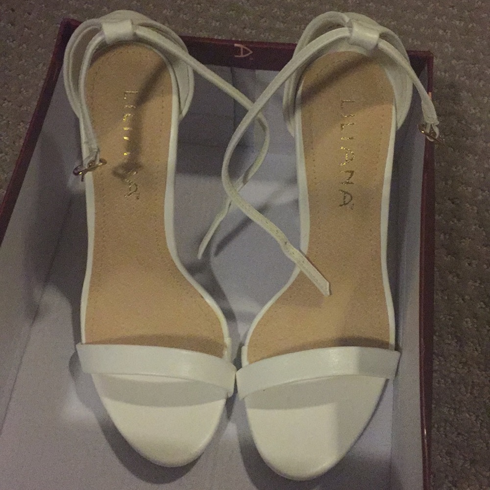 White strappy heeled sandals